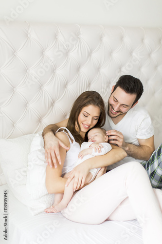 Happy family with newborn baby