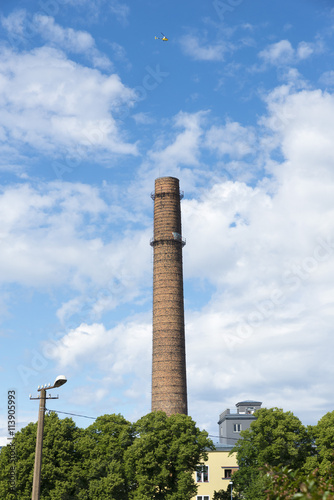 helicopter and industrial chimney