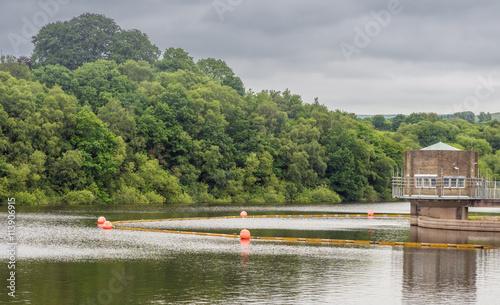 Control tower and sinkhole on Tittesworth Rerservoir, Peak District, UK photo