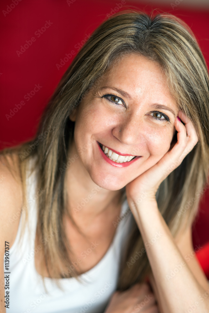 Fototapeta premium Attractive Adult Woman Leaning Face on Hand