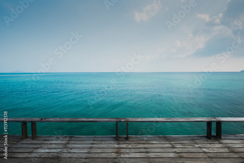 Old wooden deck and vats sea