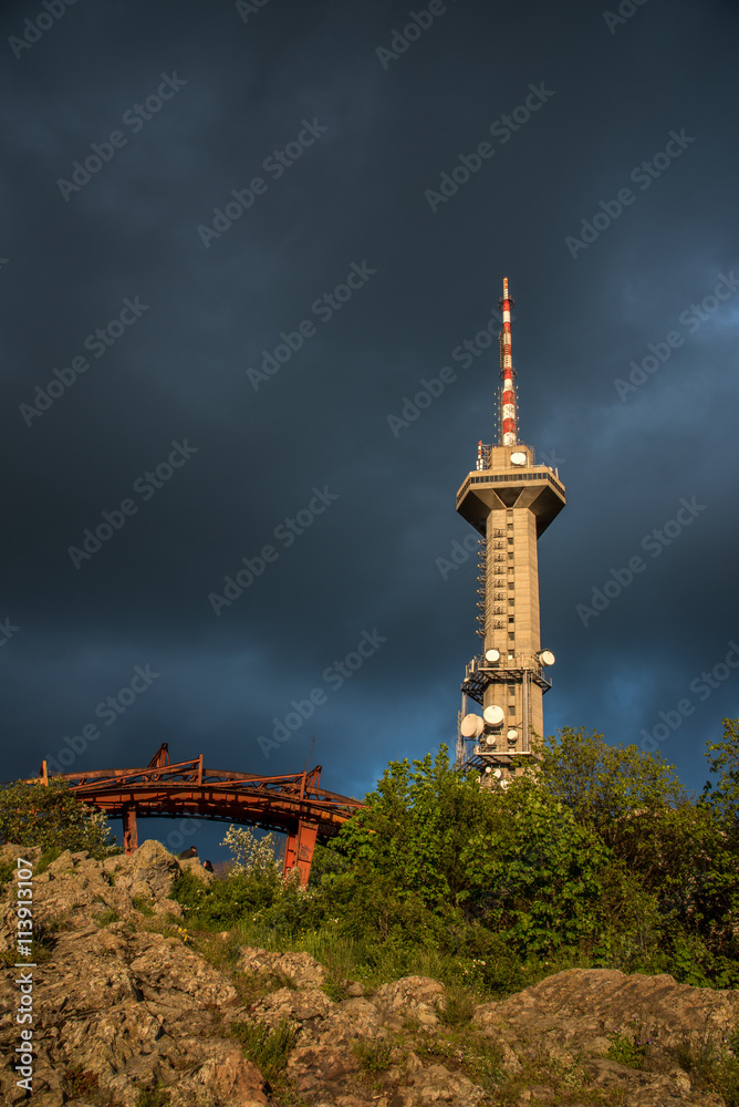 Obraz premium TV tower of Sofia, Bulgaria under heavy thunder clouds