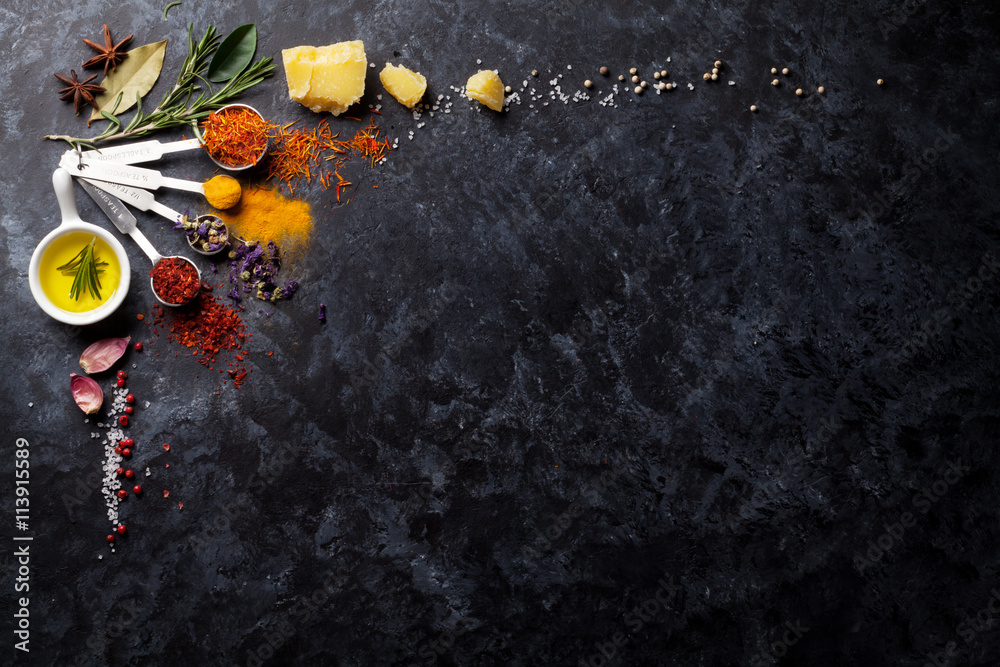 Wunschmotiv: Herbs and spices over black stone #113915589