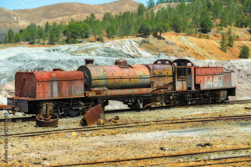 Old and abanoned trains in the minery photo