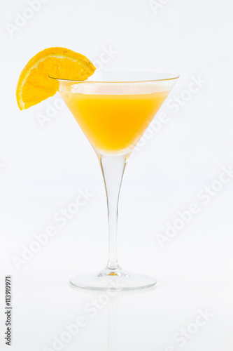 Orange juice on cocktail glass