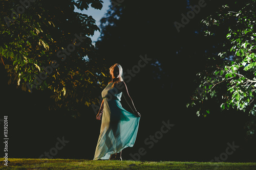 Junge Frau im Abendkleid photo