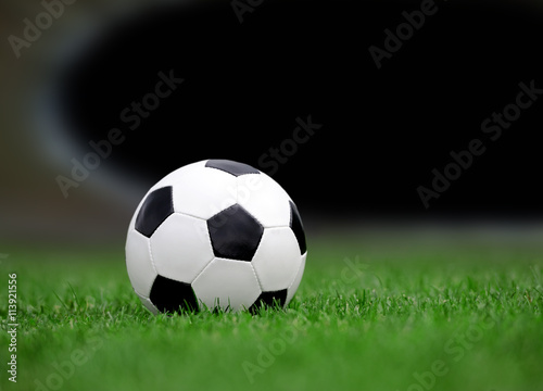 Soccer ball on green grass