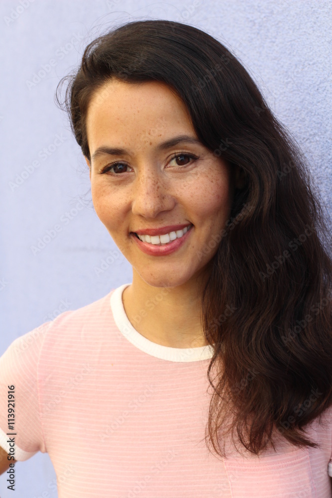 Portrait of a young Hispanic female smiling Portrait of a young Hispanic female smiling