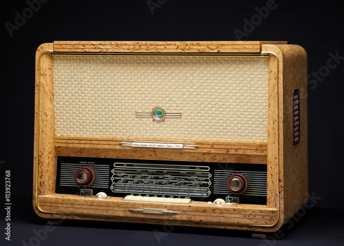 Old vintage radio on a dark background