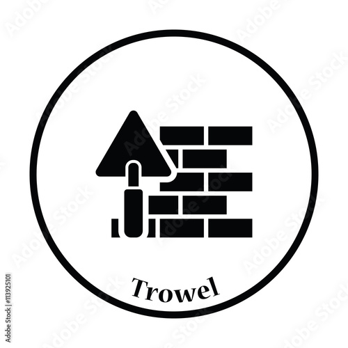 Icon of brick wall with trowel