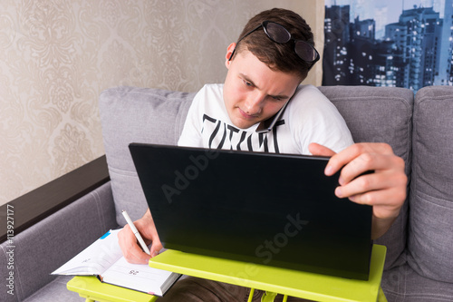 Bewildered man working from home