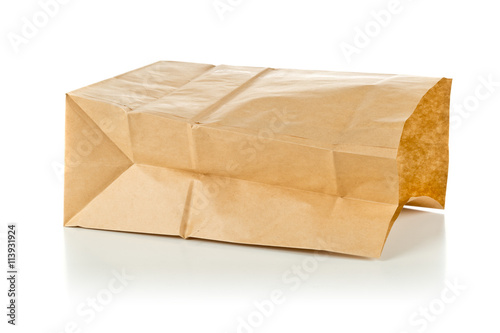 Recycled brown paper bag over white background