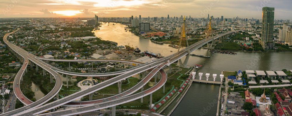 Fototapeta premium aerial view of bhumiphol bridge crossing chaopraya river importa