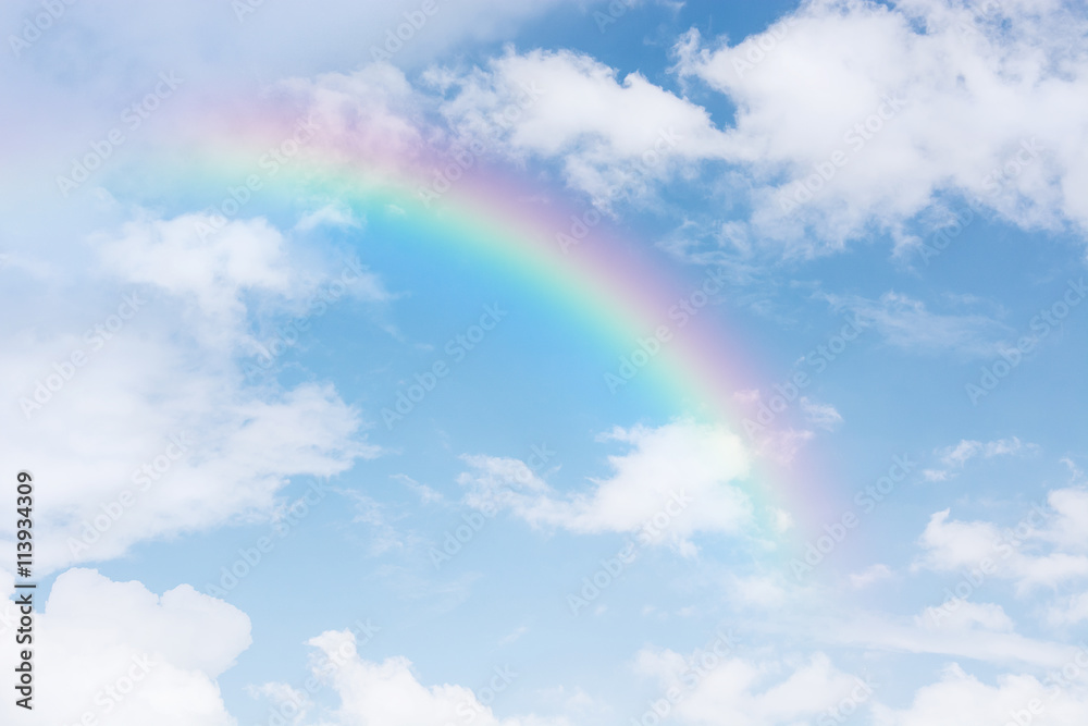 beautiful classic rainbow across in the blue sky after the rain