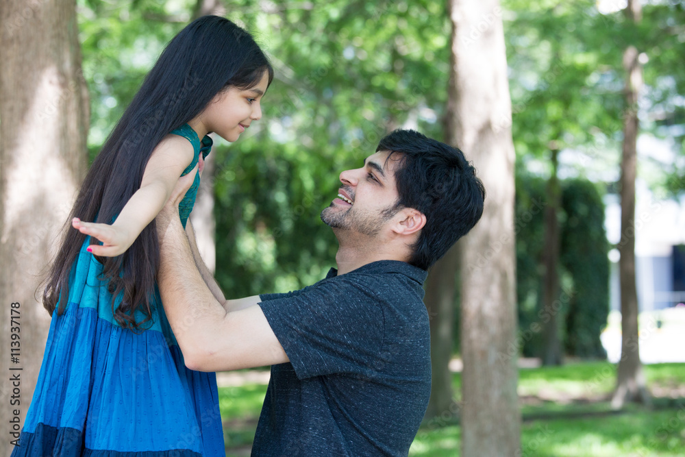 Closeup portrait, single dad and child having some fun outside in park, isolated outdoors background.