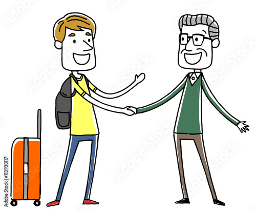 外国人旅行者と握手するシニアの男性
