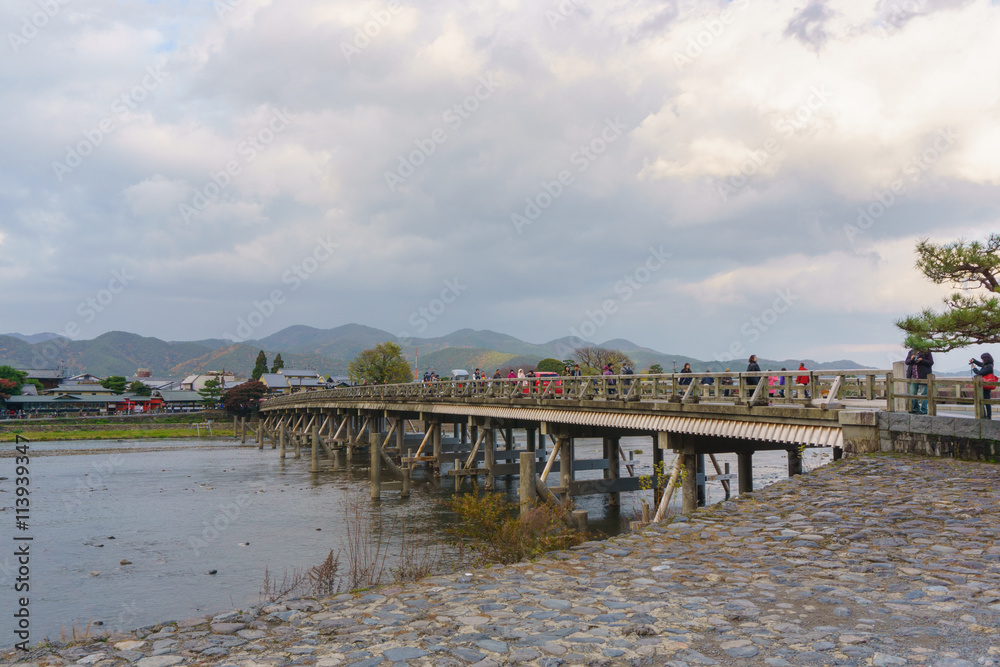 Kyoto, Japan - December 3, 2015: Katsura River and Togetsukyo Bridge in Arashiyama, Kyoto, Japan
