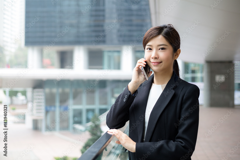 Businesswoman chat on mobile phone Businesswoman chat on mobile phone