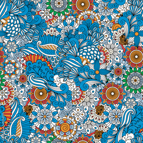Full frame background made from floral designs and geometric patterns colored blue  red  green and brown