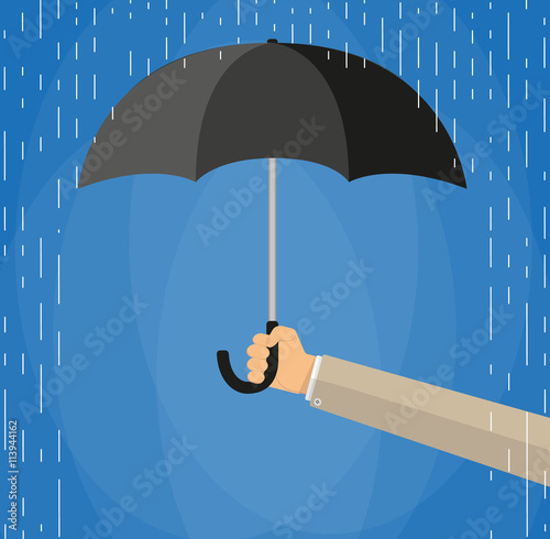 Hand of man holding an umbrella