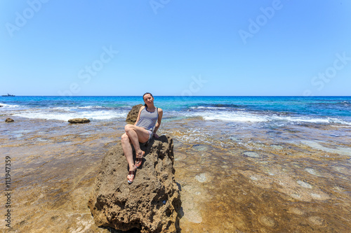Girl in coastline of Rosh Hanikra. Israel