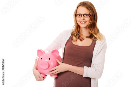 Young woman holding piggybank