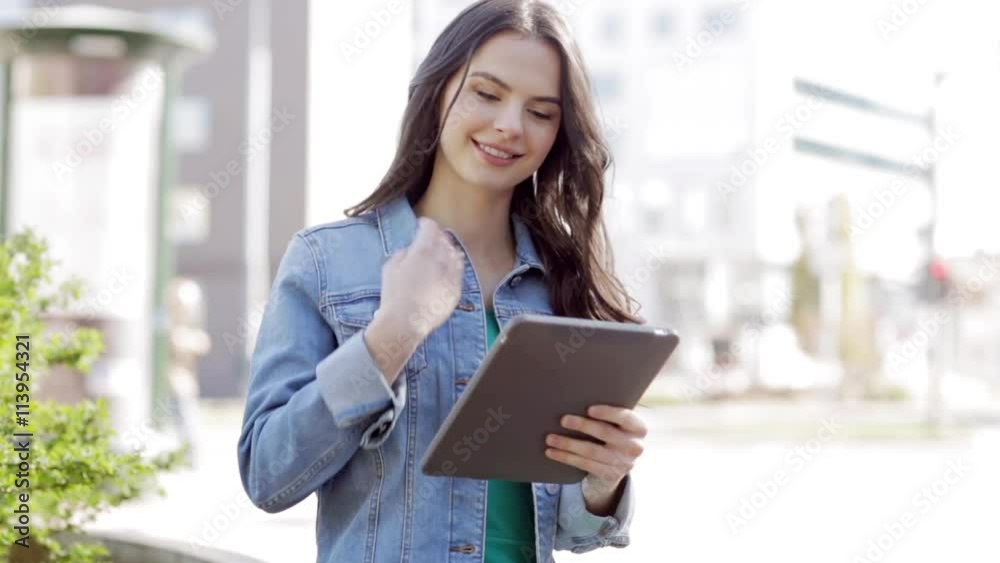 happy young woman or teenage girl with tablet pc happy young woman or teenage girl with tablet pc
