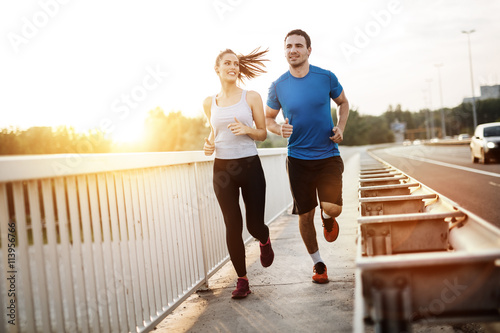 Active couple jogging photo