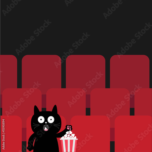 Cat in movie theater eating popcorn.  Cute cartoon character. Film show Cinema background. Viewer kitten watching movie. Red seats hall. Dark background. Flat design