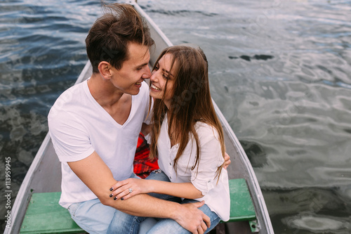 Couple in boat © teksomolika