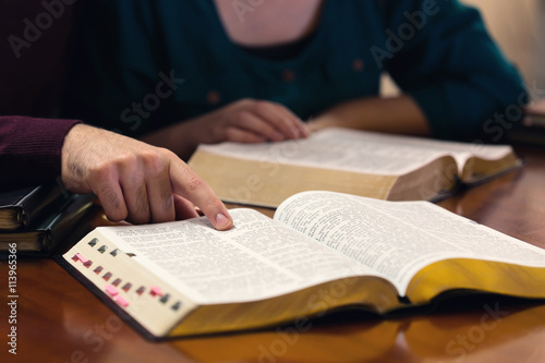 Tableau sur toile Young Couple Studying The Bible