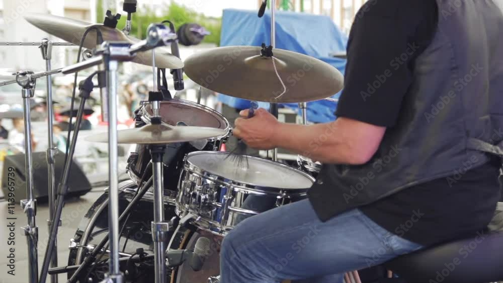 Man playing a musical instrument Man playing a musical instrument