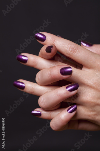 Close up of female hands over black