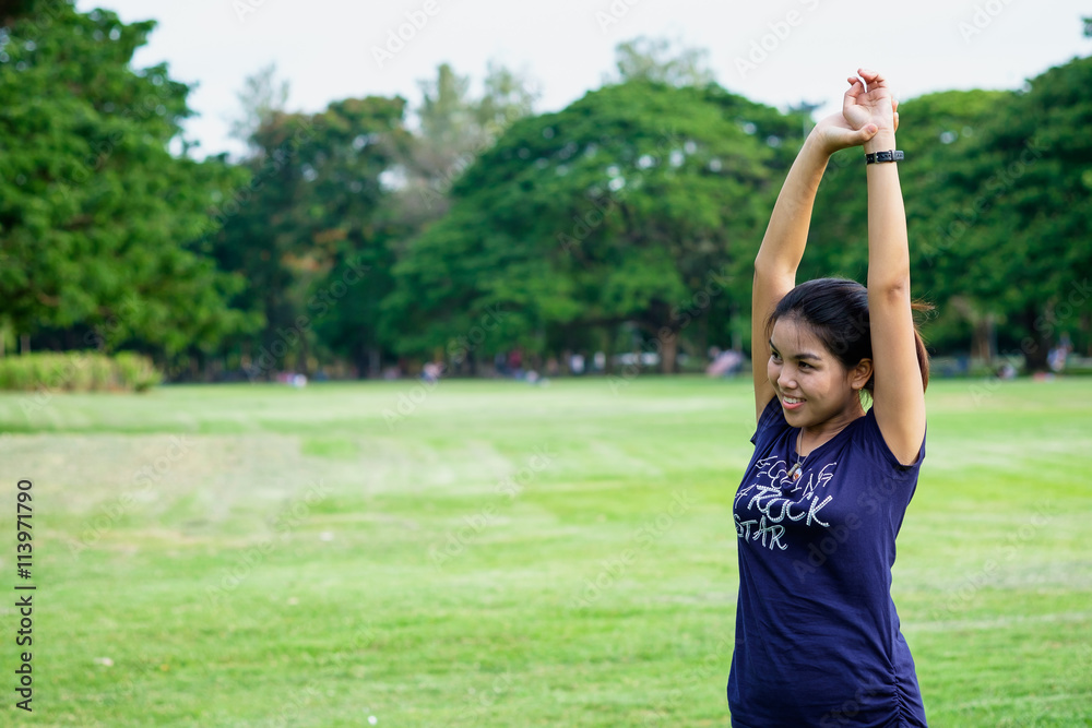 Young happy woman in green field Young happy woman in green field
