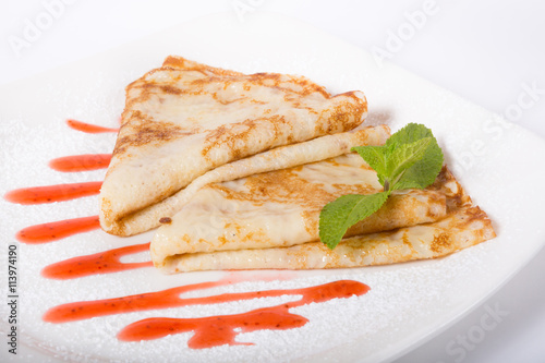 Prepared pancakes with sweet topping