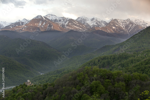 Mountain landscape with the old church, Russia, Caucasus. © vkph