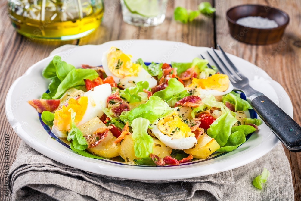 potato salad with eggs, lettuce, tomatoes and bacon potato salad with eggs, lettuce, tomatoes and bacon