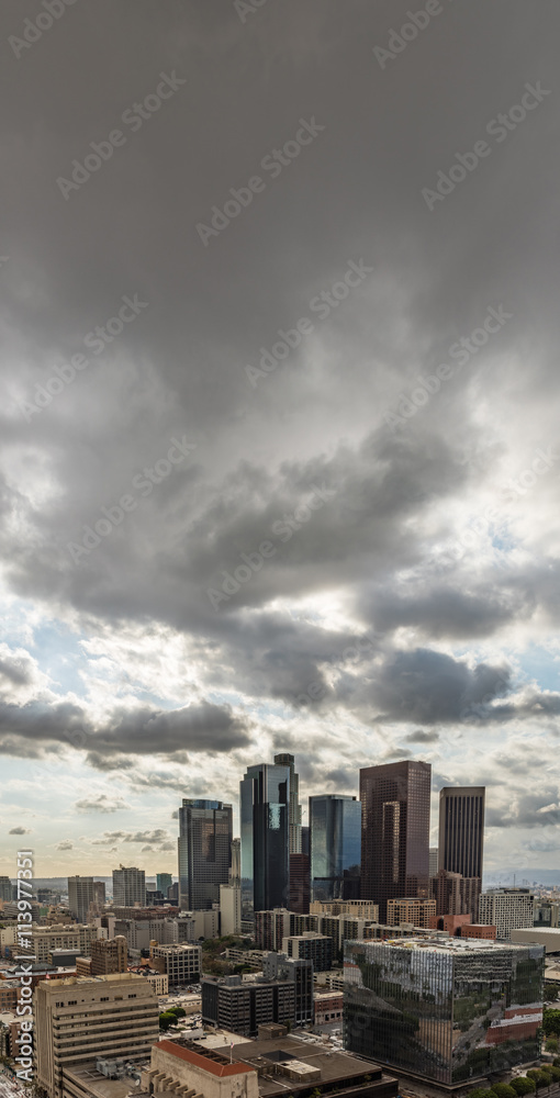 Fototapeta premium Downtown Los Angeles skyline with dark clouds