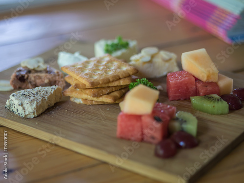Cream cheese platter with fruits salad