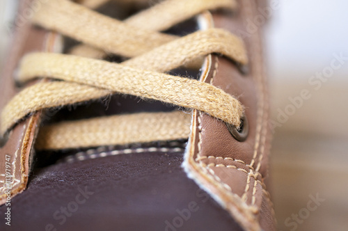 Child's textile brown sneakers. Child's fashion. Child's style,