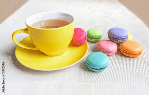 Cup of tea with macaroon.