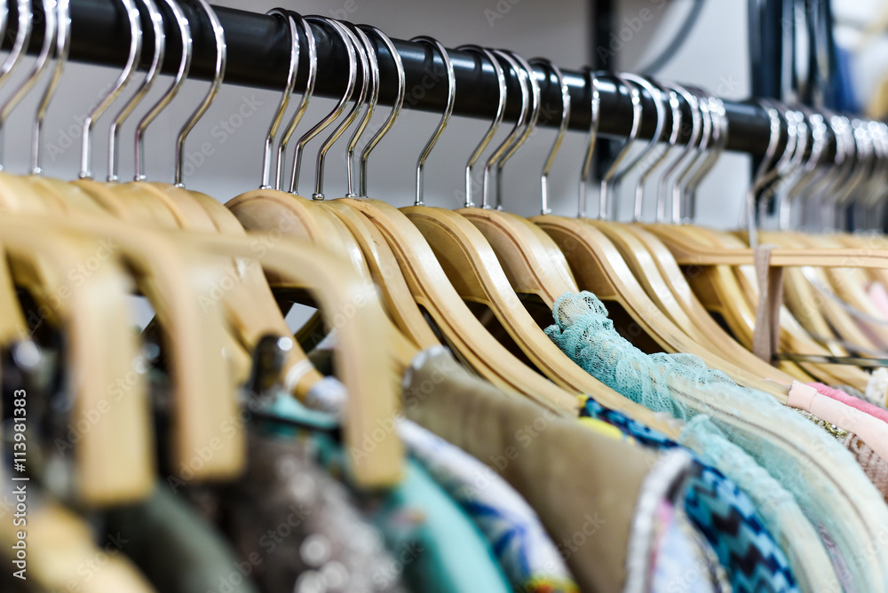 Fototapeta premium Racks of clothes in a store