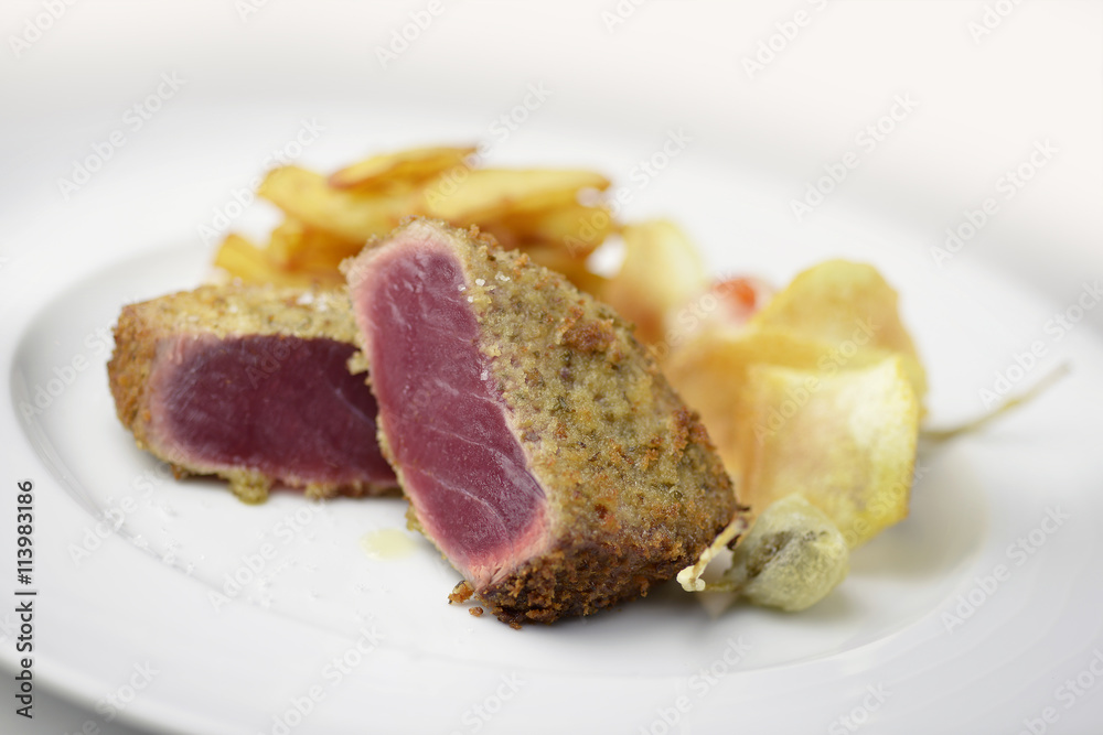 Fish dish escalope bluefin tuna breading capers and potatoes