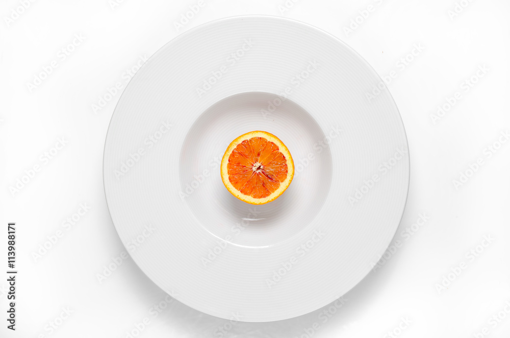Chopped orange on the plate Chopped orange on the plate