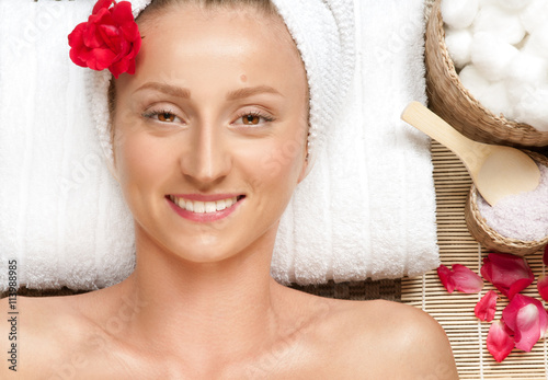 Portrait of young beautiful woman in spa salon