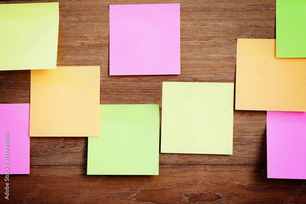 Blank sticky paper note on wall Blank sticky paper note on wall
