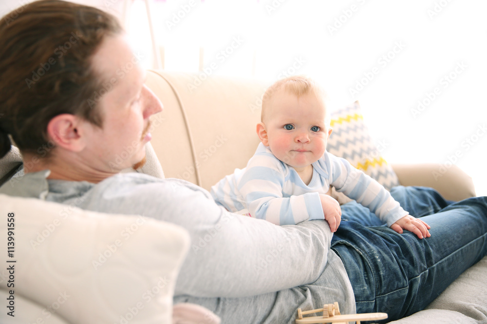 Young father having fun with his little son Young father having fun with his little son