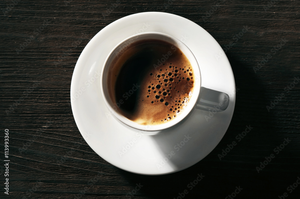Cup of fresh coffee on wooden background Cup of fresh coffee on wooden background