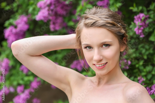 Young beautiful bride in the garden