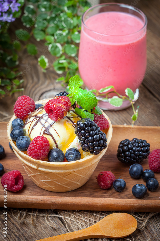 Tasty ice cream dessert with fruit in a waffle bowl. Tasty ice cream dessert with fruit in a waffle bowl.